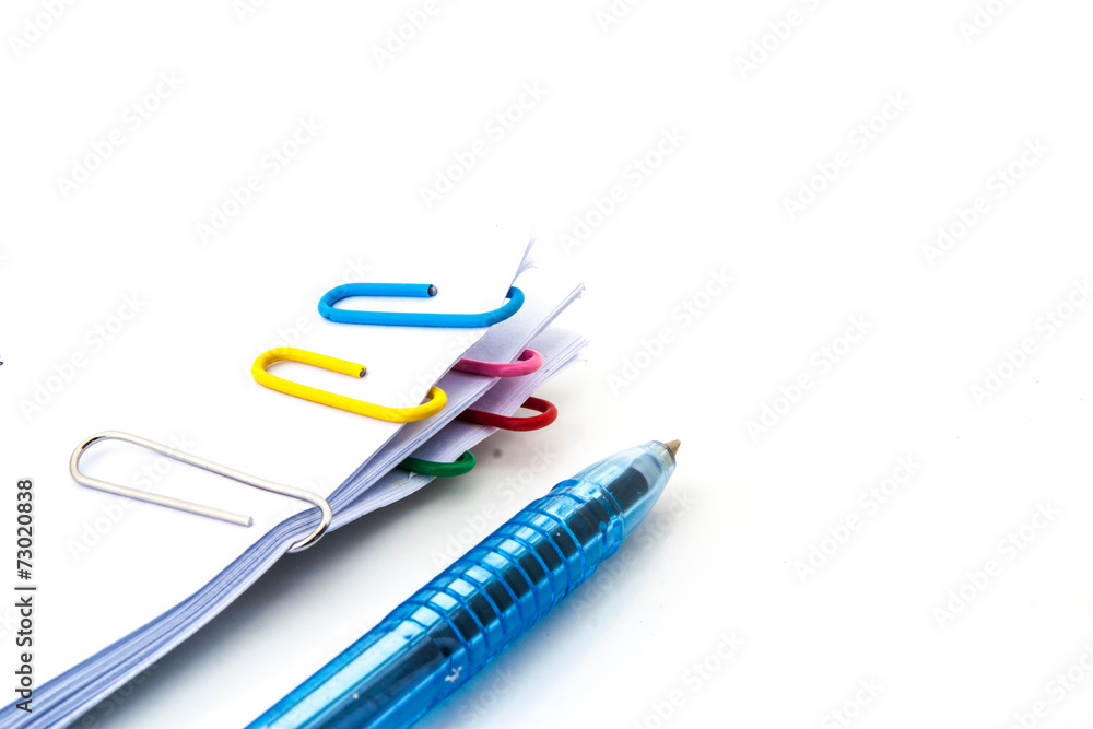 Stack of documents with colorful clips on white background Stack of documents with colorful clips on white background