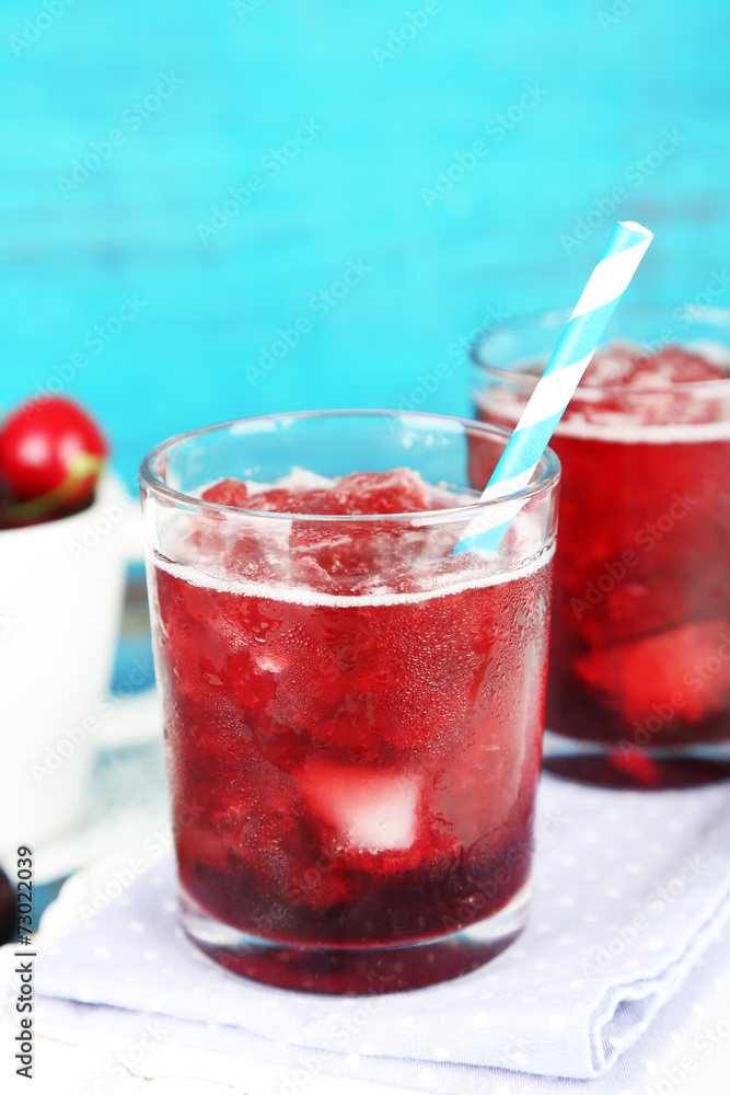 Closeup of cherry granita in glasses, on color wooden Closeup of cherry granita in glasses, on color wooden