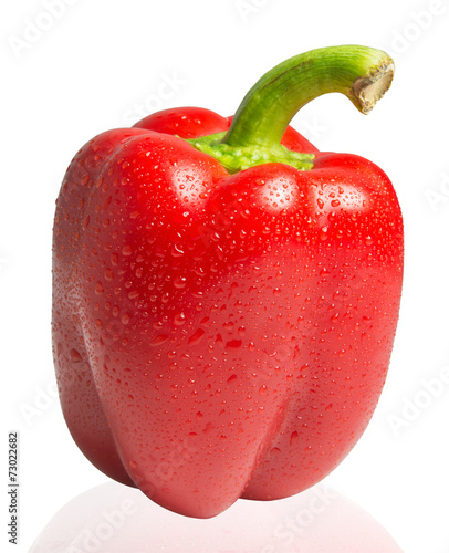 Water drops on red bell pepper isolated on white background