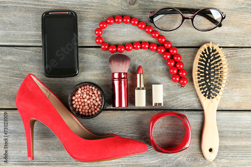 Essentials fashion woman objects on wooden background