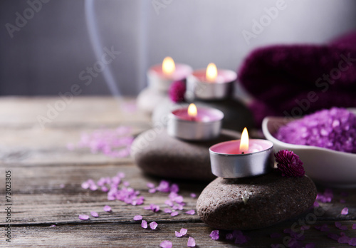 Composition of spa treatment on table on grey background