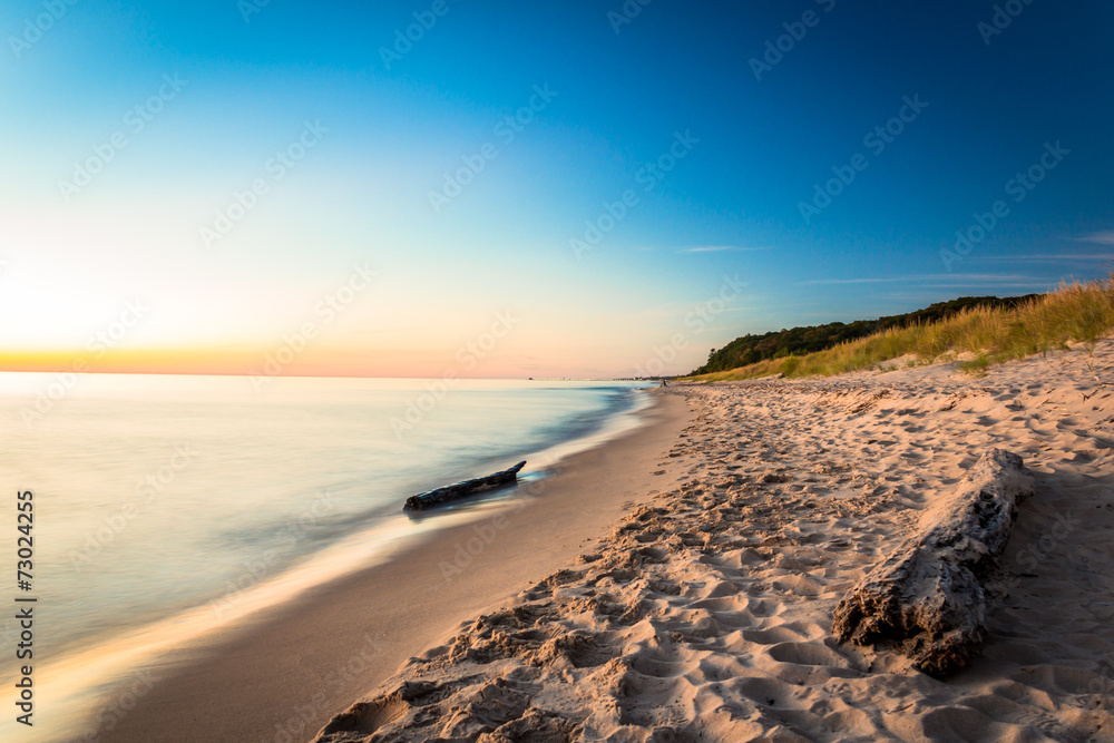 Lake Michigan Pastels. Glowing Beach at Sunset. Natural Beauty Background with Copy Space.