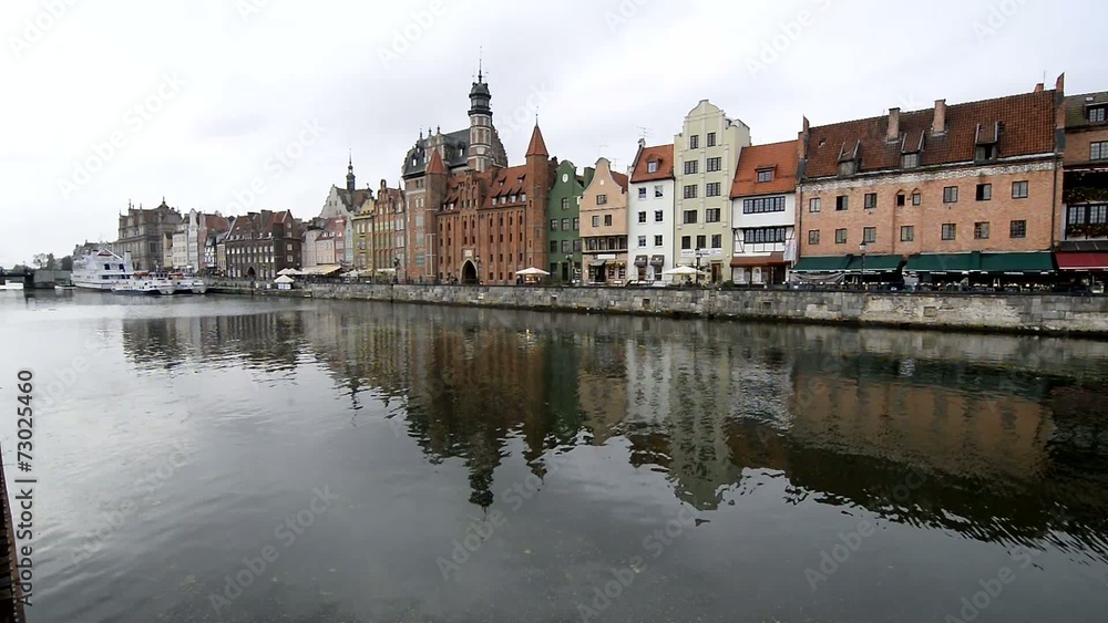 The classic view of Gdansk reflected in the River Motlawa. The classic view of Gdansk reflected in the River Motlawa.