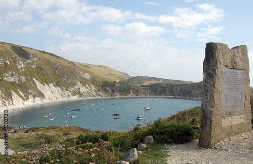 Memorial stone above Lulworth Cove on Dorset coast