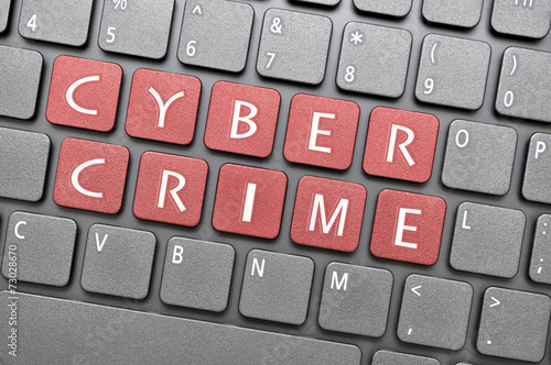 Cyber crime key on keyboard