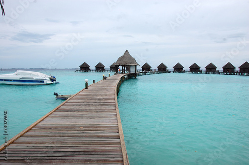 Fototapeta Naklejka Na Ścianę i Meble -  Timber pier and bungalow at Maldives