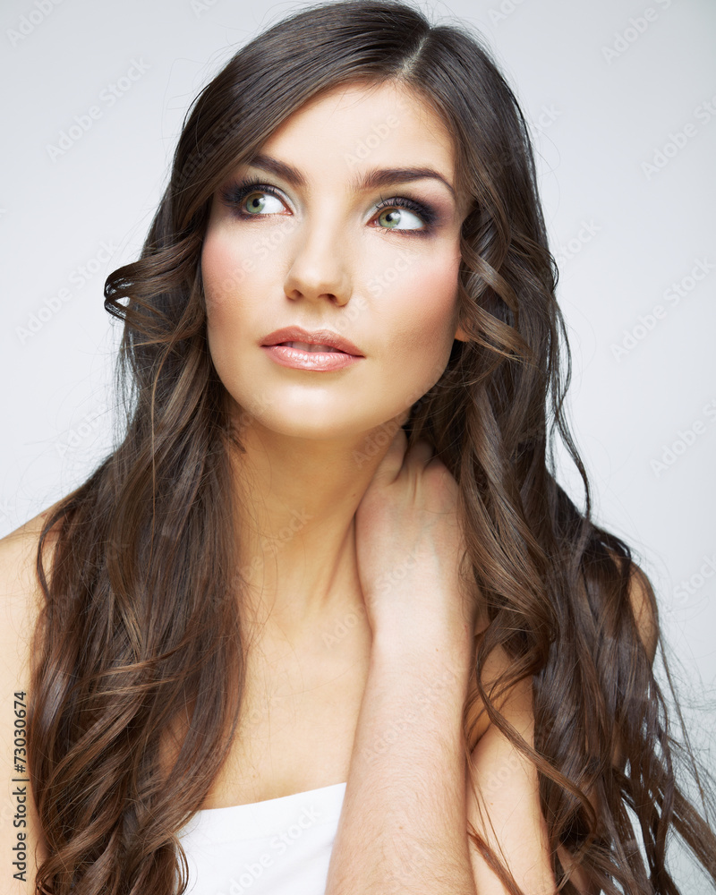 Woman face close up beauty portrait. Girl with long hair lookin Woman face close up beauty portrait. Girl with long hair lookin