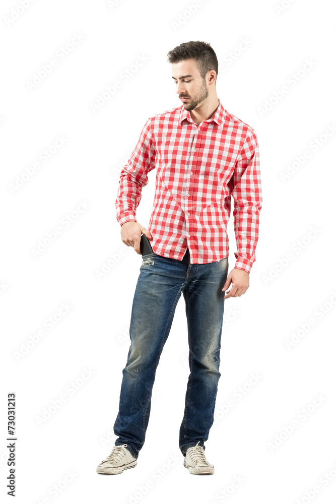 Man taking mobile phone from pocket Man taking mobile phone from pocket