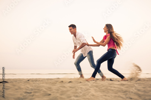 Beautiful Couple having fun on beach