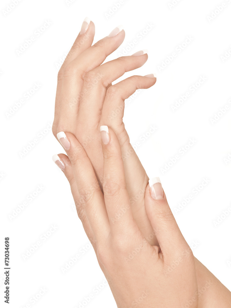 Manos de mujer sobre fondo blanco aislado. Vista de frente Manos de mujer sobre fondo blanco aislado. Vista de frente