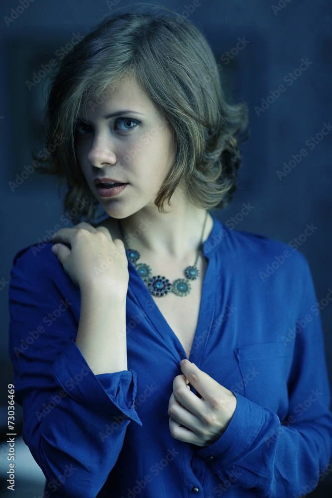Fototapeta premium Glamorous sexy beautiful girl at the table