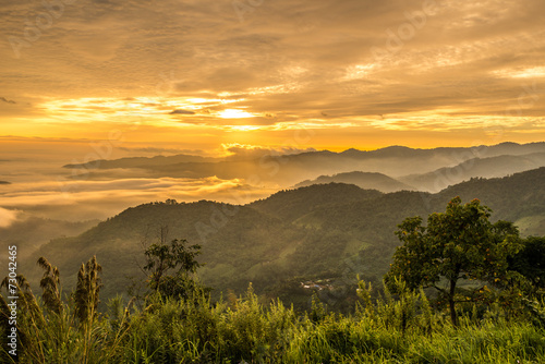 Beautiful sunrise on Doi Kart Phee the remote highland mountains area in Chiang Rai province of Thailand.