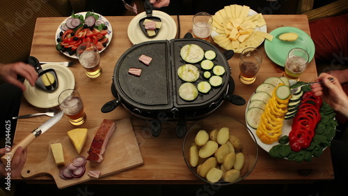 Friends eating grilled vegetable, drinking beer - time-lapse