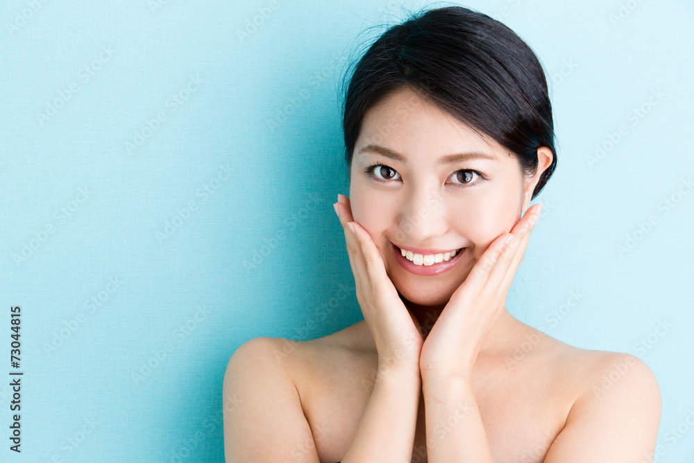 attractive asian woman beauty image on blue background attractive asian woman beauty image on blue background