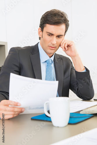 Serious Businessman reading...