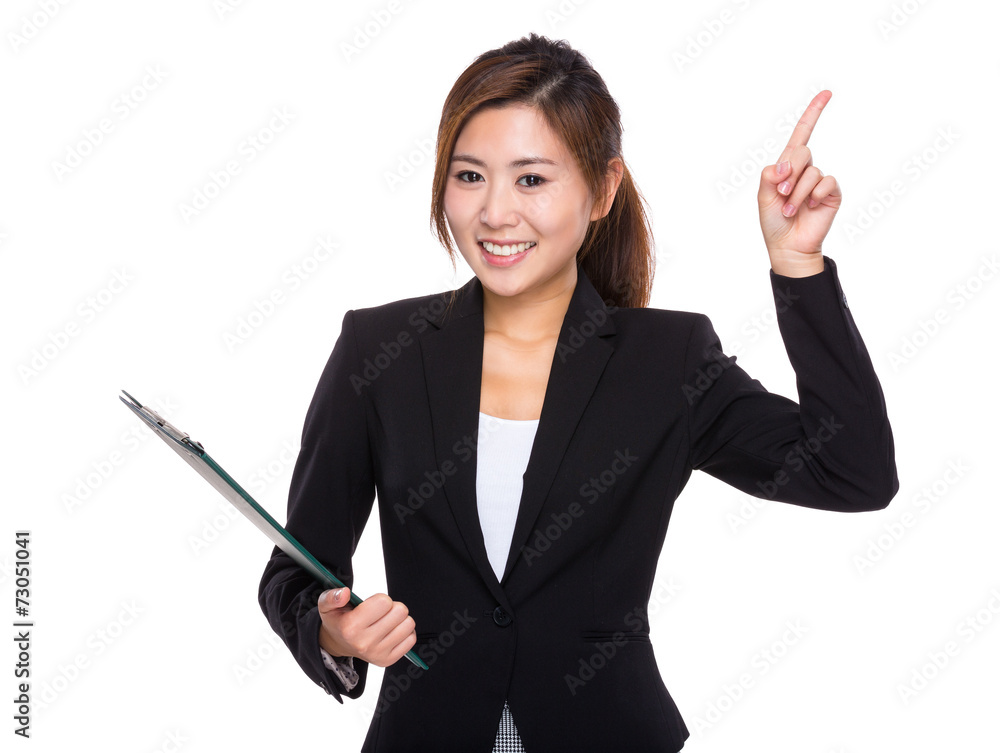 Businesswoman with clipboard and finger up Businesswoman with clipboard and finger up