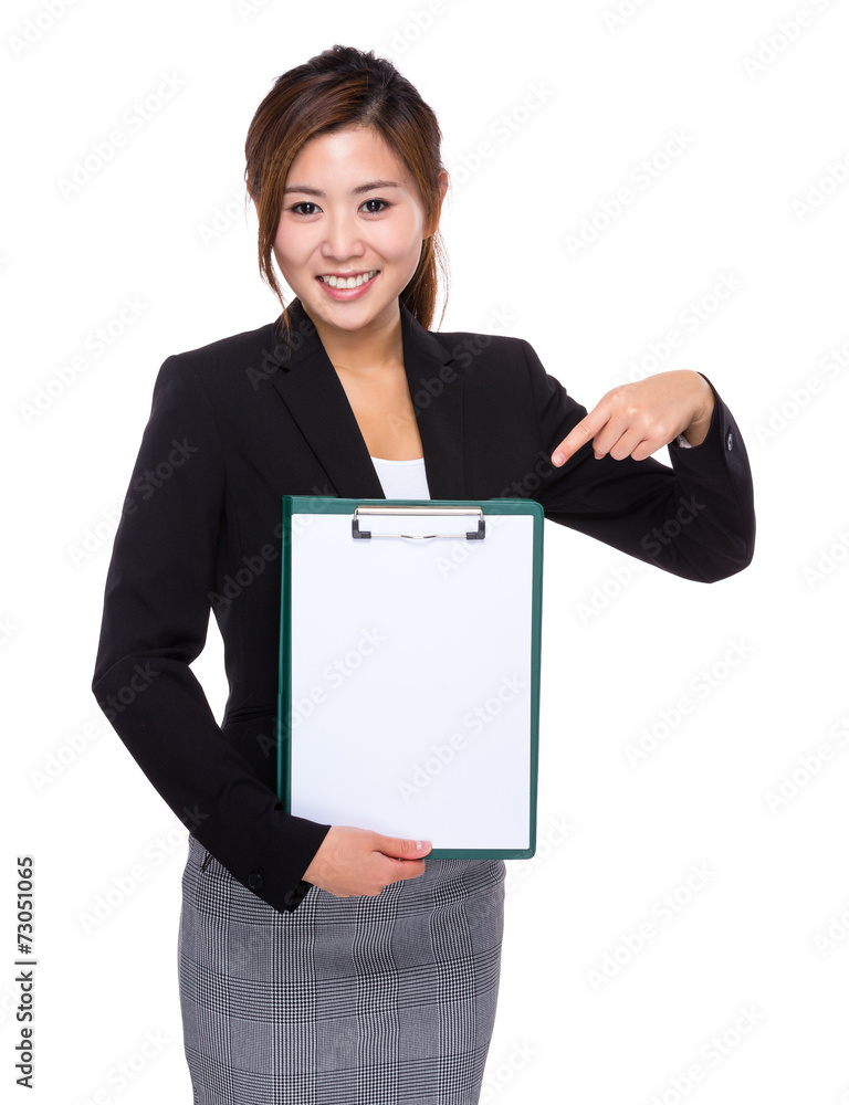 Businesswoman finger point to white paper of clipboard Businesswoman finger point to white paper of clipboard