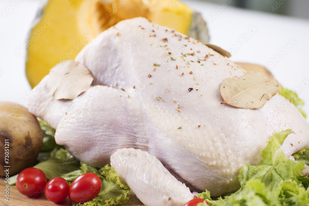 Raw whole chicken on the board Raw whole chicken on the board