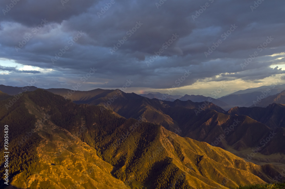 Altai mountains lit by the setting sun.