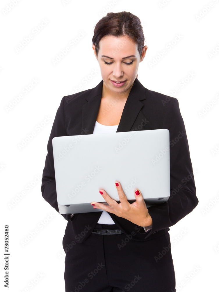 Businesswoman use of laptop computer Businesswoman use of laptop computer