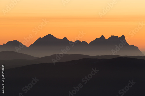 mountain range in late sunset photo