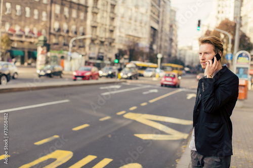 Young man on the street wit...