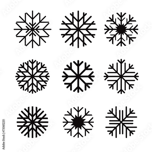 Set of black vector snowflakes