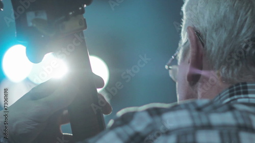 Emotional man playing the cello double bass photo