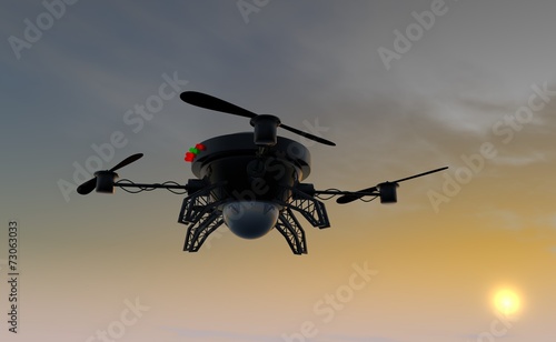 Fototapeta Naklejka Na Ścianę i Meble -  Flying drone by sunset