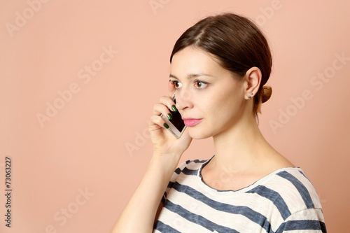 Young woman on cell phone photo
