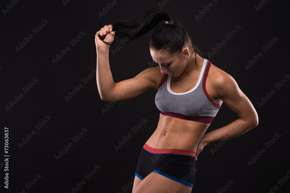 Young sports-looking nice lady with dark hair Young sports-looking nice lady with dark hair