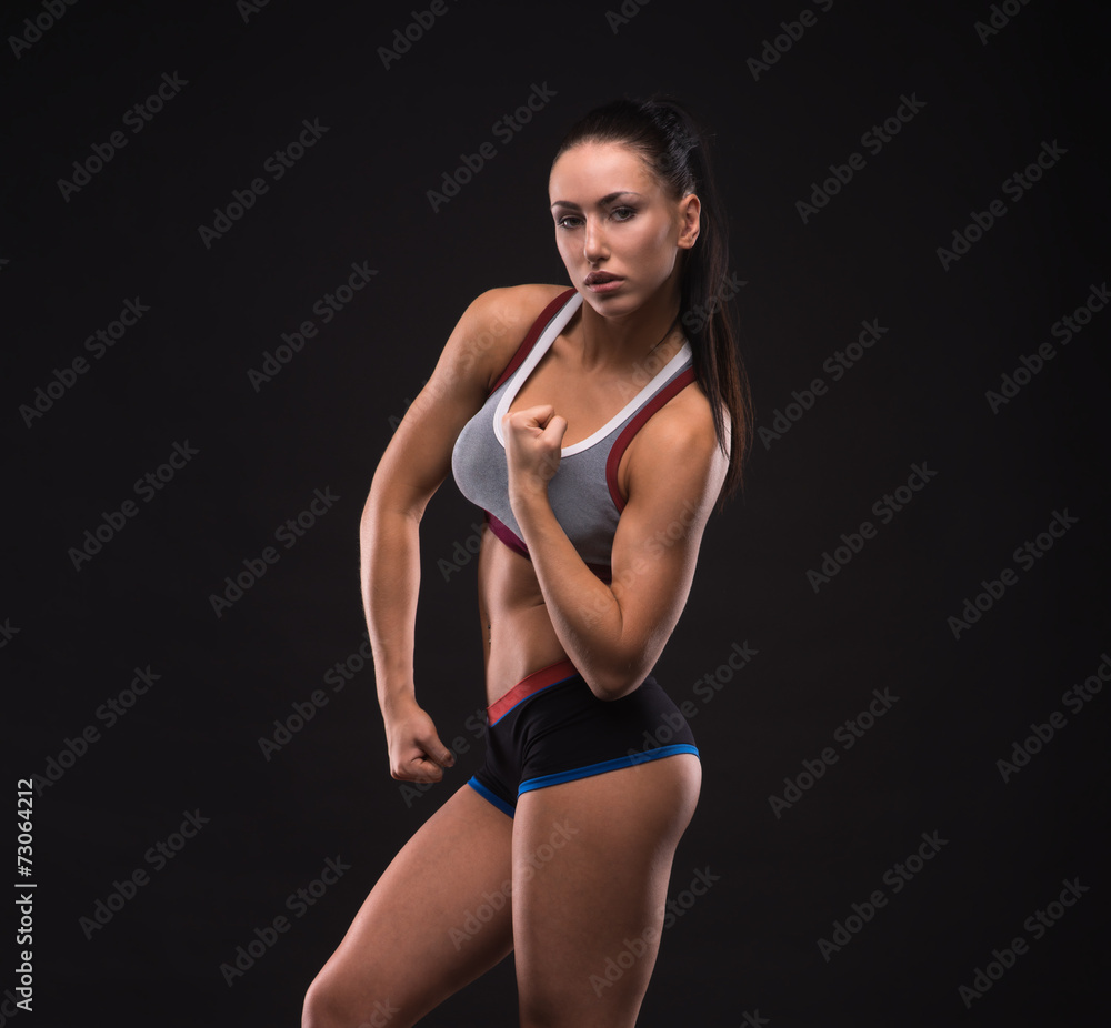 Young sports-looking nice lady with dark hair Young sports-looking nice lady with dark hair