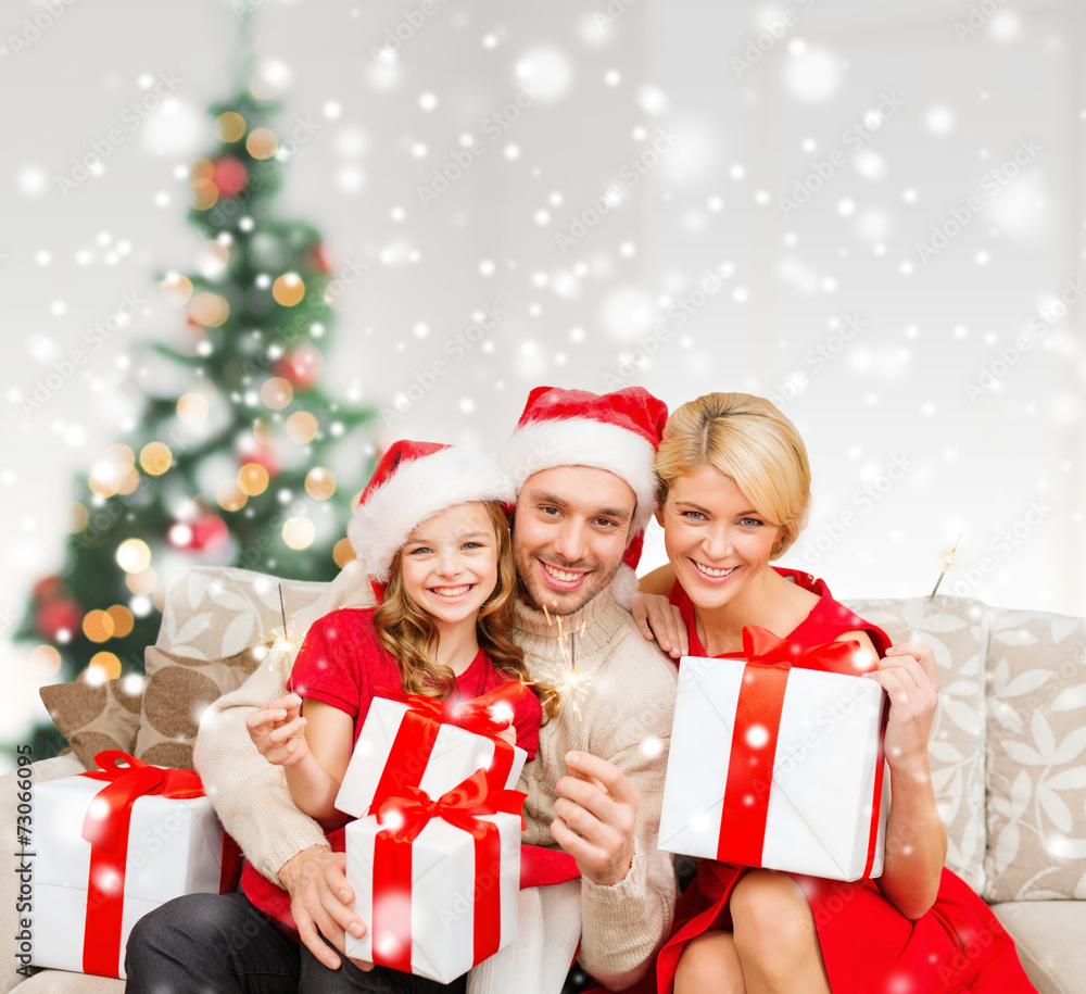 smiling family holding many gift boxes smiling family holding many gift boxes