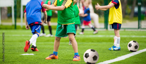 Fototapeta Naklejka Na Ścianę i Meble -  kids playing football soccer match