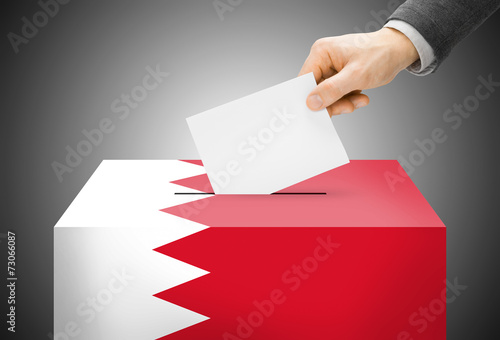 Ballot box painted into national flag colors - Bahrain