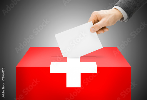 Ballot box painted into national flag colors - Switzerland photo