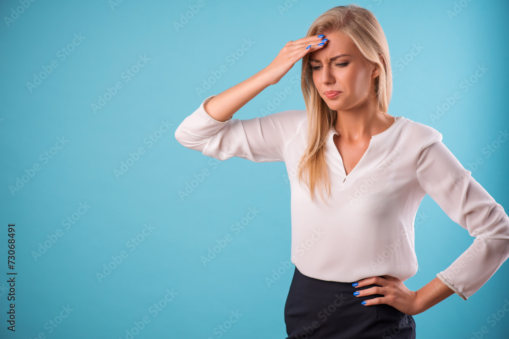 Fototapeta premium Lovely blonde wearing white blouse