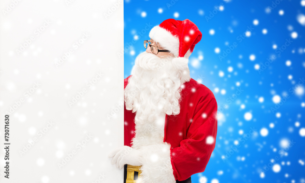 man in costume of santa claus with billboard man in costume of santa claus with billboard