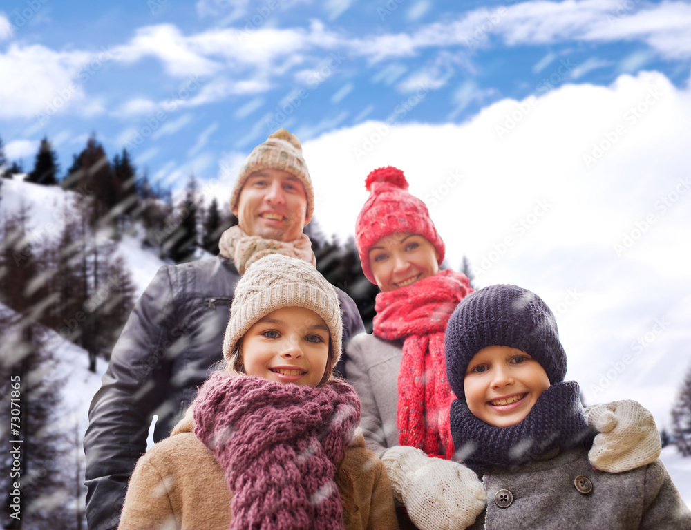happy family in winter clothes outdoors happy family in winter clothes outdoors