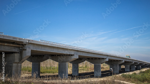 Highway bridge with concrete pylons crossing a river - Belgrade,