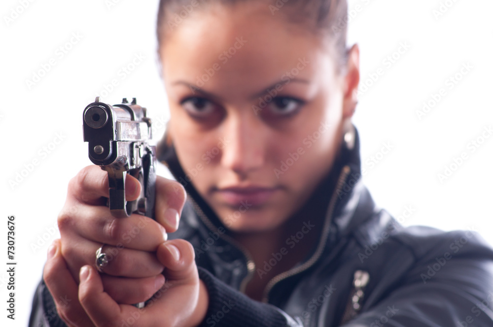 Female detective shooting with gun isolated on white background Female detective shooting with gun isolated on white background
