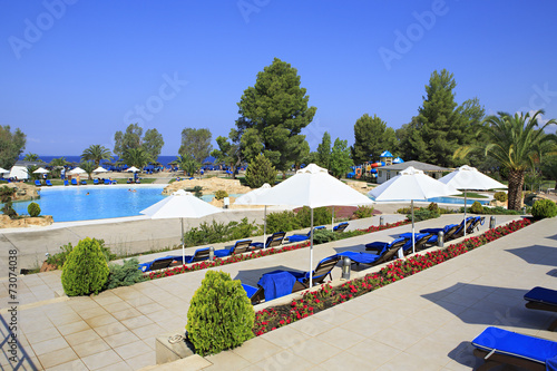 Parasols by the pool Porto Carras Meliton.