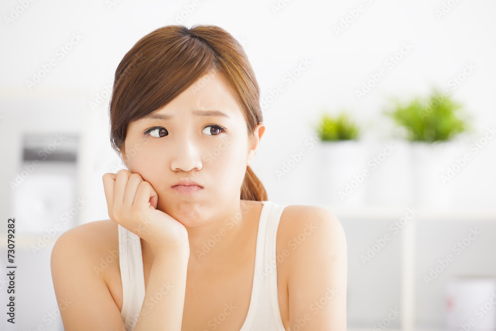 young asian woman thinking young asian woman thinking
