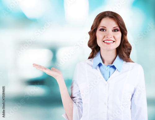 Young beautiful doctor on h...