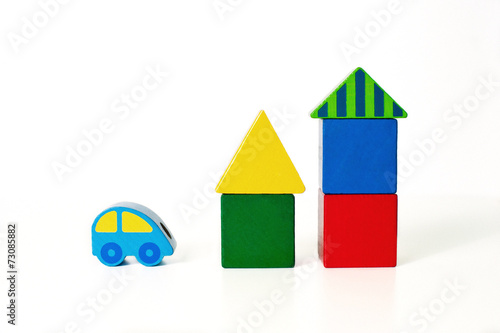 Houses and a car made from wooden blocks