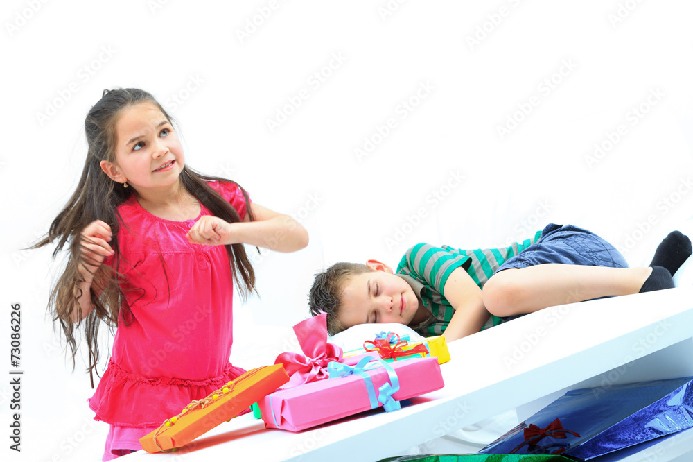 Happy cheering family in white room with presents Happy cheering family in white room with presents