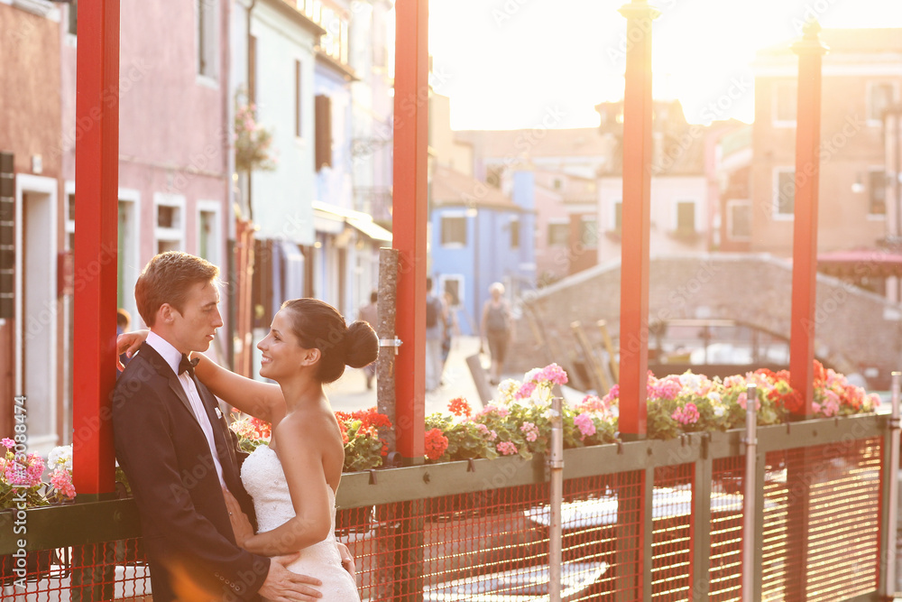 Bride and groom in Venice, having good time together Bride and groom in Venice, having good time together