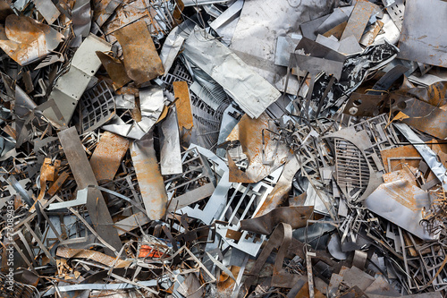 ferrous scrap and mechanisms of various sizes seen from above.