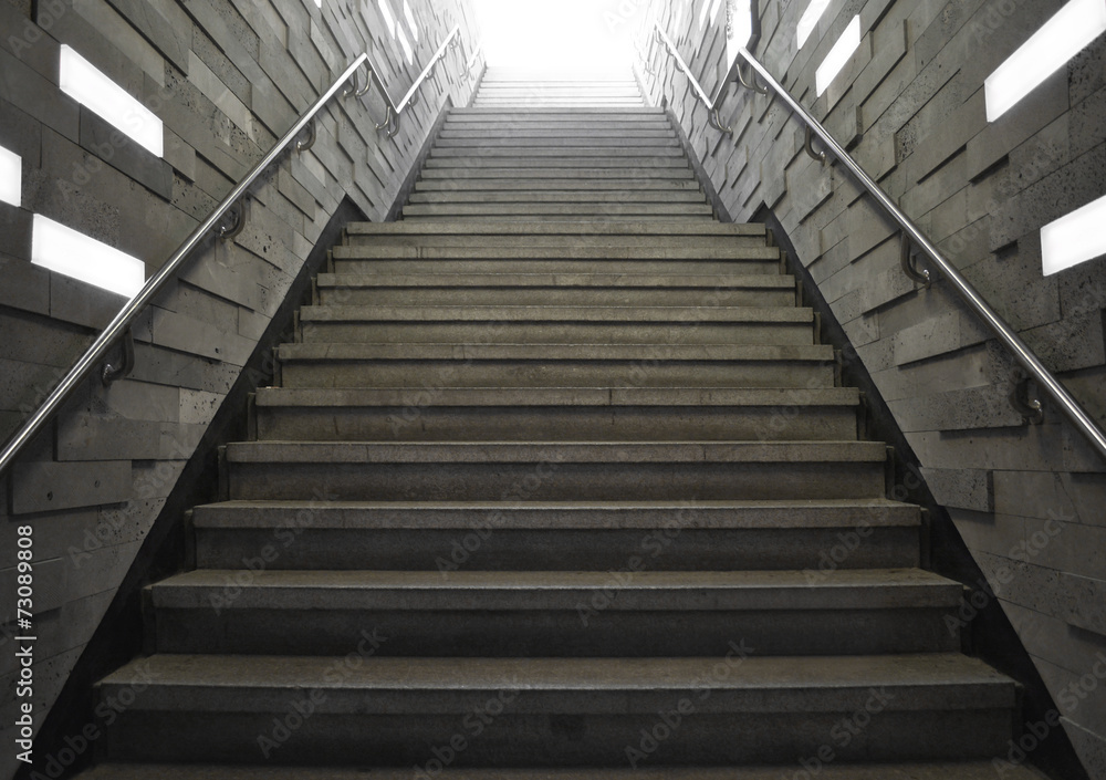 Fototapeta premium tunnel Staircase going up to the exit way