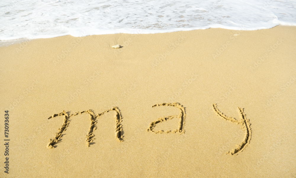 May - written in sand on beach texture May - written in sand on beach texture